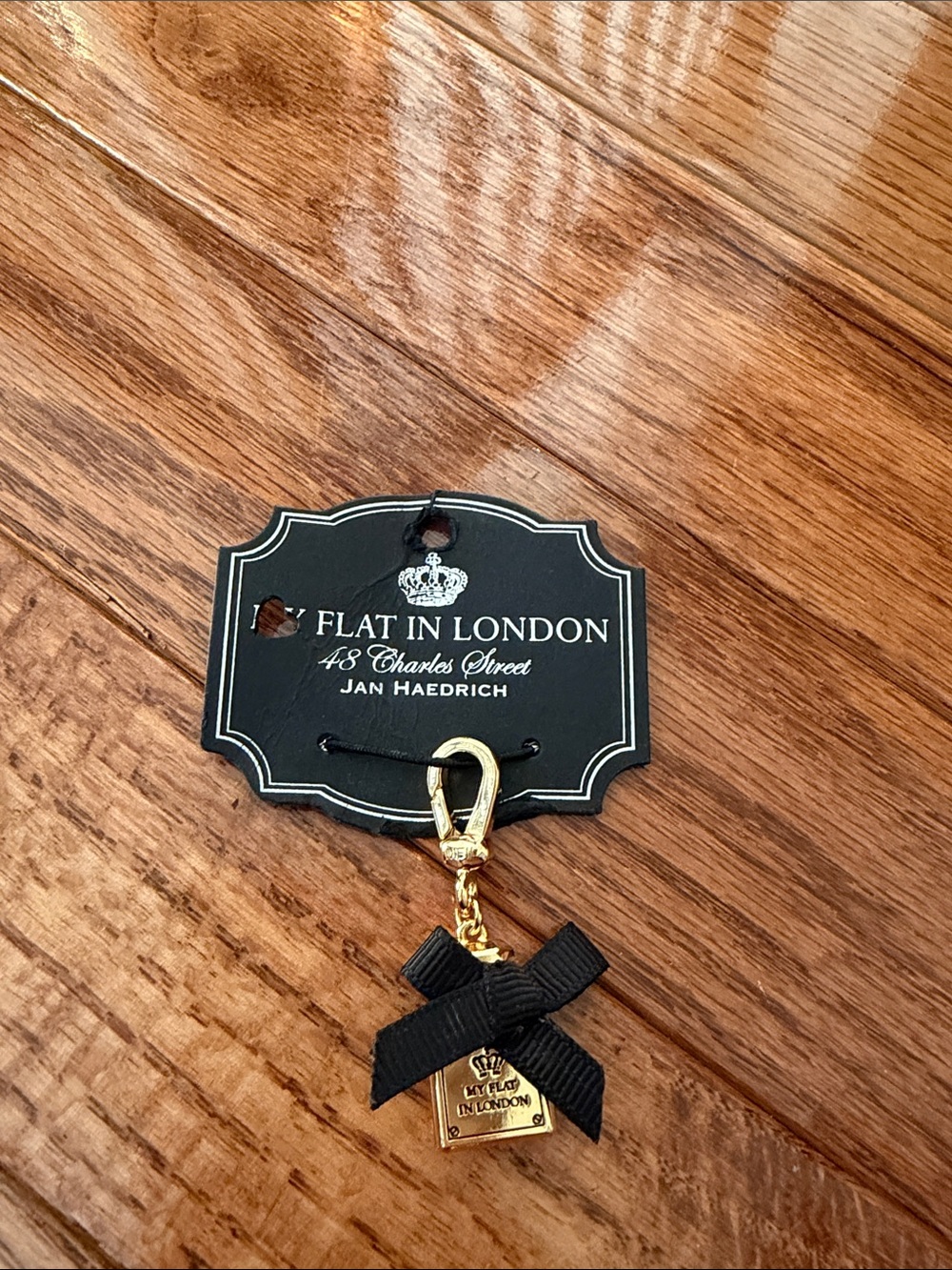 My Flat in London Gold and Black Bow Charm